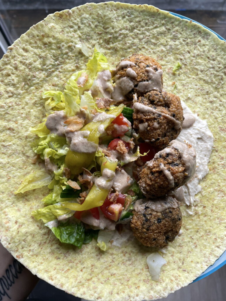 Close up falafel wrap vegan
